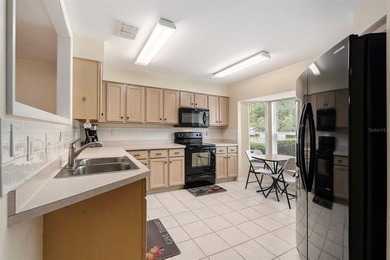 Enjoy the best of 55+ living in the gated Tampa Bay Golf & on Tampa Bay Golf and Country Club in Florida - for sale on GolfHomes.com, golf home, golf lot