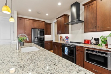 Discover the perfect blend of luxury, comfort, and Florida on Saint Andrews South Golf Club in Florida - for sale on GolfHomes.com, golf home, golf lot