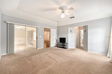 Enjoy the best of 55+ living in the gated Tampa Bay Golf & on Tampa Bay Golf and Country Club in Florida - for sale on GolfHomes.com, golf home, golf lot