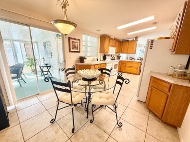 STUNNING 3-BEDROOM, 2-BATHROOM FULLY FURNISHED HOME IN A GATED on Cypress Greens in Florida - for sale on GolfHomes.com, golf home, golf lot