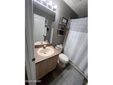 Lovely home with a decorator's touch in a great family on LPGA International Golf Course in Florida - for sale on GolfHomes.com, golf home, golf lot