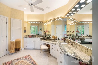Situated on beautiful Lake Ticoa in the gated community of on Connestee Falls Golf Club in North Carolina - for sale on GolfHomes.com, golf home, golf lot
