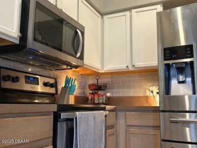 Lovely home with a decorator's touch in a great family on LPGA International Golf Course in Florida - for sale on GolfHomes.com, golf home, golf lot