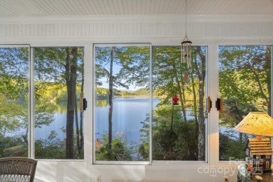 Situated on beautiful Lake Ticoa in the gated community of on Connestee Falls Golf Club in North Carolina - for sale on GolfHomes.com, golf home, golf lot