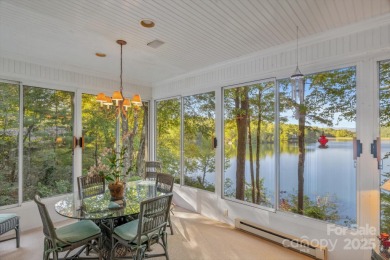 Situated on beautiful Lake Ticoa in the gated community of on Connestee Falls Golf Club in North Carolina - for sale on GolfHomes.com, golf home, golf lot