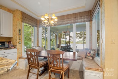 Situated on beautiful Lake Ticoa in the gated community of on Connestee Falls Golf Club in North Carolina - for sale on GolfHomes.com, golf home, golf lot