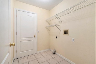 Enjoy the best of 55+ living in the gated Tampa Bay Golf & on Tampa Bay Golf and Country Club in Florida - for sale on GolfHomes.com, golf home, golf lot