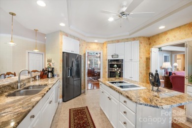 Situated on beautiful Lake Ticoa in the gated community of on Connestee Falls Golf Club in North Carolina - for sale on GolfHomes.com, golf home, golf lot