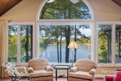 Situated on beautiful Lake Ticoa in the gated community of on Connestee Falls Golf Club in North Carolina - for sale on GolfHomes.com, golf home, golf lot