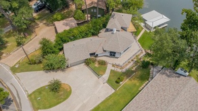 Welcome to your personal lakefront sanctuary in the prestigious on Hide-A-Way Lake Golf Course in Texas - for sale on GolfHomes.com, golf home, golf lot