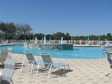 Enjoy the best of 55+ living in the gated Tampa Bay Golf & on Tampa Bay Golf and Country Club in Florida - for sale on GolfHomes.com, golf home, golf lot