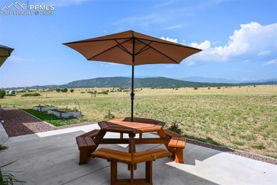 Gorgeous one level home on 5 acres with stunning mountain views! on Hollydot Golf Course in Colorado - for sale on GolfHomes.com, golf home, golf lot