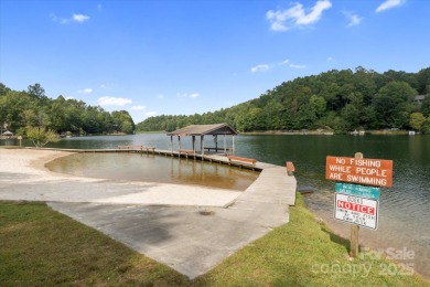 Situated on beautiful Lake Ticoa in the gated community of on Connestee Falls Golf Club in North Carolina - for sale on GolfHomes.com, golf home, golf lot