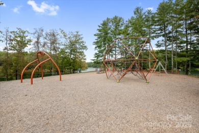 Situated on beautiful Lake Ticoa in the gated community of on Connestee Falls Golf Club in North Carolina - for sale on GolfHomes.com, golf home, golf lot
