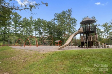 Situated on beautiful Lake Ticoa in the gated community of on Connestee Falls Golf Club in North Carolina - for sale on GolfHomes.com, golf home, golf lot
