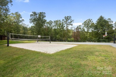 Situated on beautiful Lake Ticoa in the gated community of on Connestee Falls Golf Club in North Carolina - for sale on GolfHomes.com, golf home, golf lot