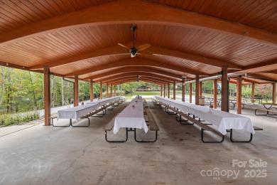 Situated on beautiful Lake Ticoa in the gated community of on Connestee Falls Golf Club in North Carolina - for sale on GolfHomes.com, golf home, golf lot