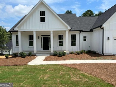 New Home and a Lake Lot. This amazing full-basement ranch home t on The Frog Golf Club in Georgia - for sale on GolfHomes.com, golf home, golf lot