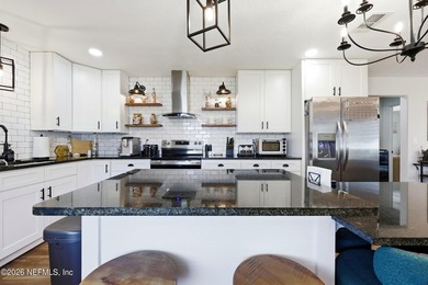 Experience coastal living at its finest in this beautifully on Jacksonville Beach Golf Course in Florida - for sale on GolfHomes.com, golf home, golf lot