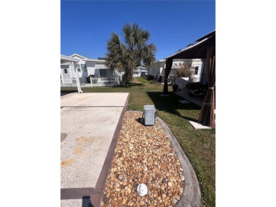 Thinking about moving to Florida for the Winters? 
Well then on Lily Lake Golf and RV Resort in Florida - for sale on GolfHomes.com, golf home, golf lot