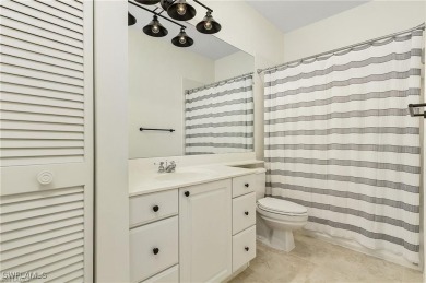 Highly sought after TURN-KEY FURNISHED carriage home in the on Bonita Bay West in Florida - for sale on GolfHomes.com, golf home, golf lot