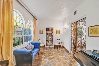 Villa Mica, a timeless beauty built ahead of its time boasting on La Gorce Country Club in Florida - for sale on GolfHomes.com, golf home, golf lot