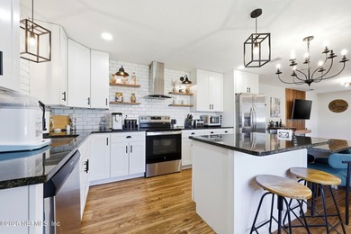 Experience coastal living at its finest in this beautifully on Jacksonville Beach Golf Course in Florida - for sale on GolfHomes.com, golf home, golf lot