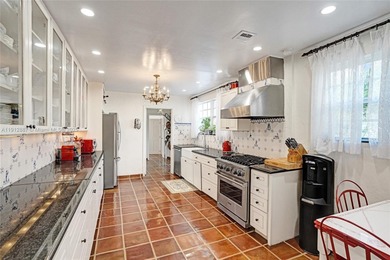 Villa Mica, a timeless beauty built ahead of its time boasting on La Gorce Country Club in Florida - for sale on GolfHomes.com, golf home, golf lot