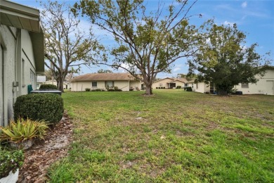 Discover effortless resort-style living in this charming 1 on Falcon Watch Golf Club in Florida - for sale on GolfHomes.com, golf home, golf lot