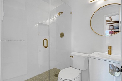 Villa Mica, a timeless beauty built ahead of its time boasting on La Gorce Country Club in Florida - for sale on GolfHomes.com, golf home, golf lot