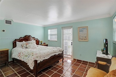 Villa Mica, a timeless beauty built ahead of its time boasting on La Gorce Country Club in Florida - for sale on GolfHomes.com, golf home, golf lot