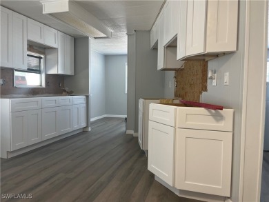 NEW & IMPROVED!!!e get this STEAL of a unit in MUCH DESIRED on Six Lakes Country Club in Florida - for sale on GolfHomes.com, golf home, golf lot