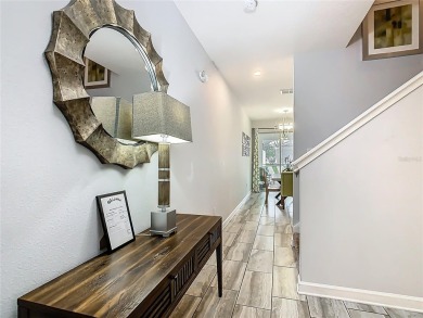 Discover this stunning 4-bedroom, 3-bathroom townhouse in the on The Oasis Club at Champions Gate in Florida - for sale on GolfHomes.com, golf home, golf lot