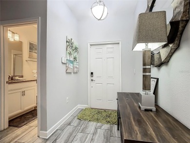 Discover this stunning 4-bedroom, 3-bathroom townhouse in the on The Oasis Club at Champions Gate in Florida - for sale on GolfHomes.com, golf home, golf lot