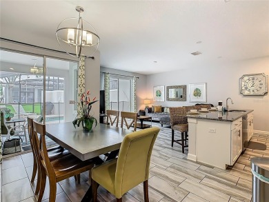 Discover this stunning 4-bedroom, 3-bathroom townhouse in the on The Oasis Club at Champions Gate in Florida - for sale on GolfHomes.com, golf home, golf lot