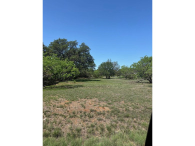 Large level lot in Horseshoe Bay West with great trees and on Ram Rock Golf Course in Texas - for sale on GolfHomes.com, golf home, golf lot