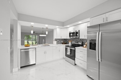 Welcome to this beautifully updated 2/2 unit w/a serene golf on Flamingo Lakes Country Club in Florida - for sale on GolfHomes.com, golf home, golf lot