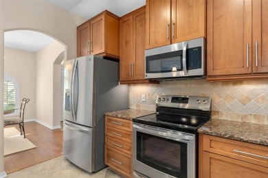 Upgraded St Clair model located on the 12th hole on the on Kings Ridge Golf Club in Florida - for sale on GolfHomes.com, golf home, golf lot