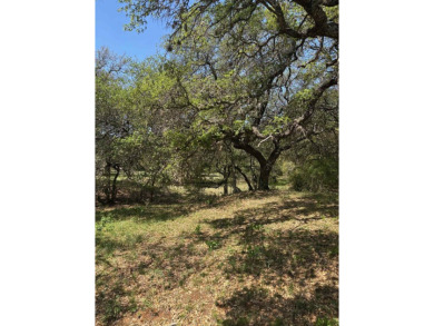 Large level lot in Horseshoe Bay West with great trees and on Ram Rock Golf Course in Texas - for sale on GolfHomes.com, golf home, golf lot