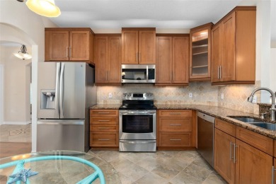 Upgraded St Clair model located on the 12th hole on the on Kings Ridge Golf Club in Florida - for sale on GolfHomes.com, golf home, golf lot