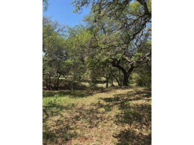 Large level lot in Horseshoe Bay West with great trees and on Ram Rock Golf Course in Texas - for sale on GolfHomes.com, golf home, golf lot
