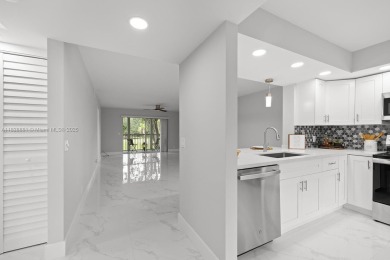 Welcome to this beautifully updated 2/2 unit w/a serene golf on Flamingo Lakes Country Club in Florida - for sale on GolfHomes.com, golf home, golf lot