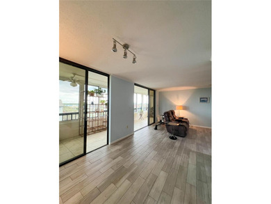 Welcome to this exquisitely updated 3-bedroom, 2-bath top-floor on Feather Sound Country Club in Florida - for sale on GolfHomes.com, golf home, golf lot