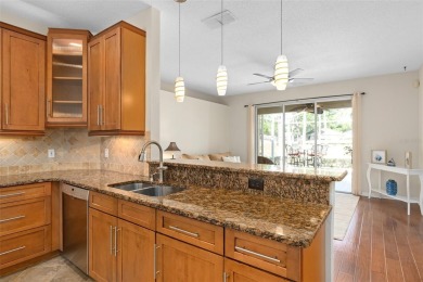 Upgraded St Clair model located on the 12th hole on the on Kings Ridge Golf Club in Florida - for sale on GolfHomes.com, golf home, golf lot