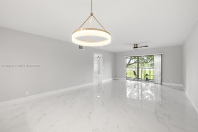 Welcome to this beautifully updated 2/2 unit w/a serene golf on Flamingo Lakes Country Club in Florida - for sale on GolfHomes.com, golf home, golf lot
