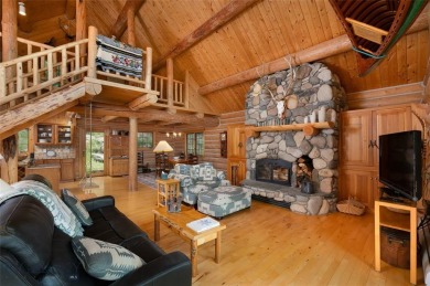 This charming log home, nestled in the trees and perched above on Big Sky of Montana Golf Course in Montana - for sale on GolfHomes.com, golf home, golf lot