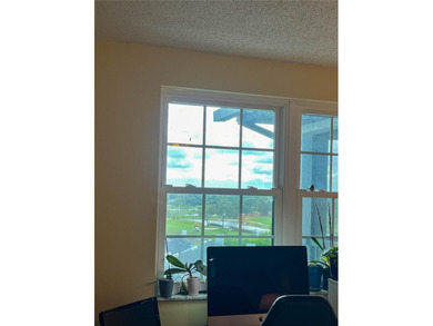 Welcome to this exquisitely updated 3-bedroom, 2-bath top-floor on Feather Sound Country Club in Florida - for sale on GolfHomes.com, golf home, golf lot