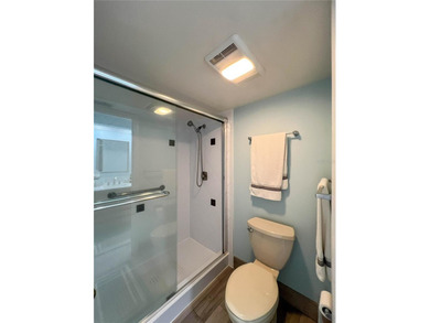 Welcome to this exquisitely updated 3-bedroom, 2-bath top-floor on Feather Sound Country Club in Florida - for sale on GolfHomes.com, golf home, golf lot