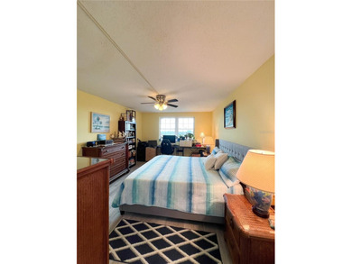 Welcome to this exquisitely updated 3-bedroom, 2-bath top-floor on Feather Sound Country Club in Florida - for sale on GolfHomes.com, golf home, golf lot