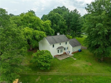 Welcome to this beautifully maintained home nestled in the on Lake Louise Golf Club in North Carolina - for sale on GolfHomes.com, golf home, golf lot